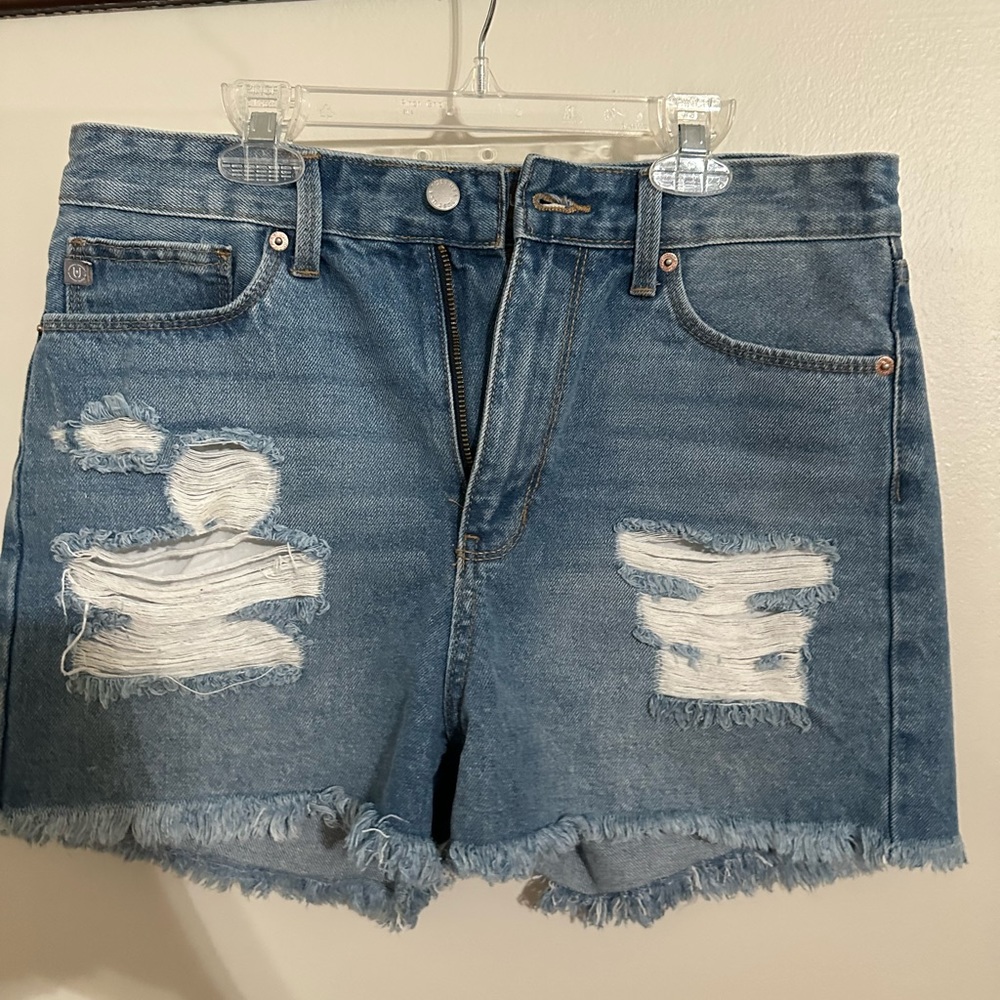 Just USA ripped jean shorts. Size M.